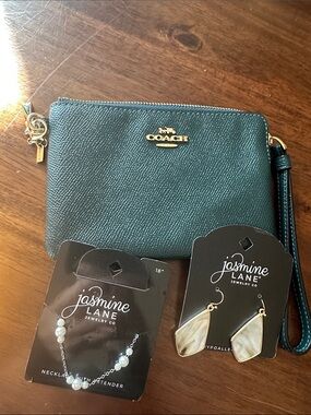 Coach Teal Pebbled Leather Wristlet with Gold Logo